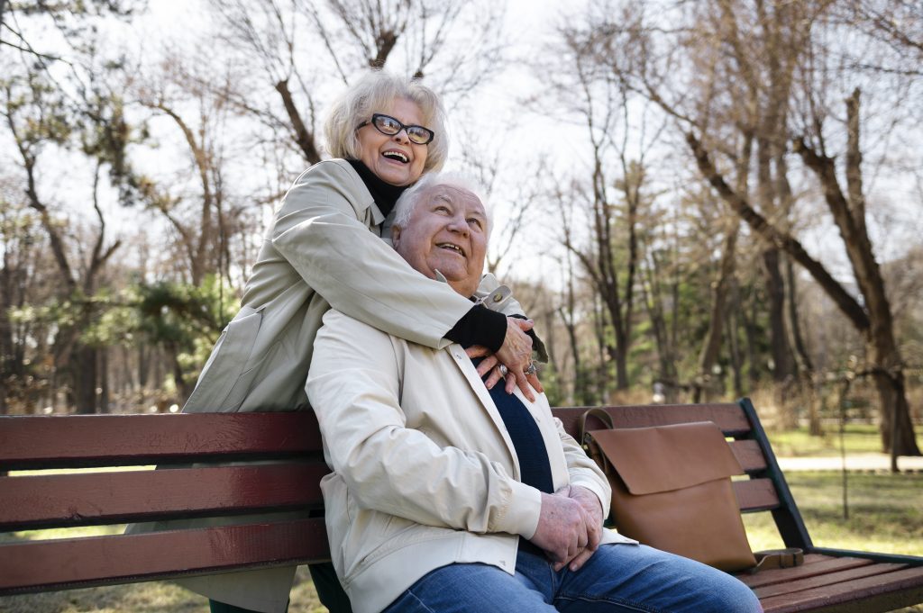 medium shot smiley senior people nature